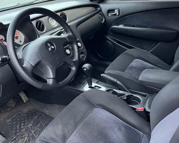 Серый Мицубиси Аутлендер, объемом двигателя 2.38 л и пробегом 180 тыс. км за 6000 $, фото 23 на Automoto.ua