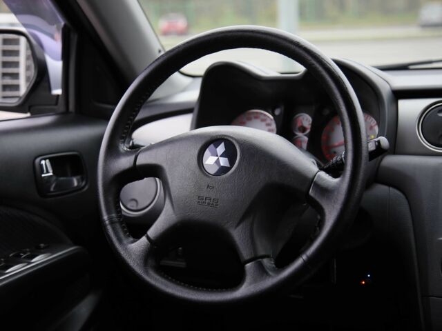 Серый Мицубиси Аутлендер, объемом двигателя 2.4 л и пробегом 171 тыс. км за 8200 $, фото 13 на Automoto.ua