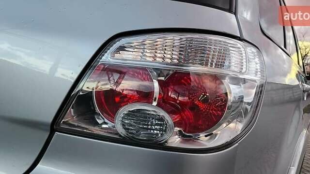 Серый Мицубиси Аутлендер, объемом двигателя 2.38 л и пробегом 228 тыс. км за 7900 $, фото 15 на Automoto.ua