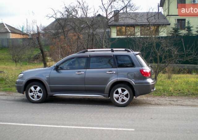 Серый Мицубиси Аутлендер, объемом двигателя 2.4 л и пробегом 235 тыс. км за 6500 $, фото 17 на Automoto.ua