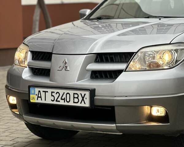 Сірий Міцубісі Аутлендер, об'ємом двигуна 2.4 л та пробігом 98 тис. км за 7199 $, фото 9 на Automoto.ua