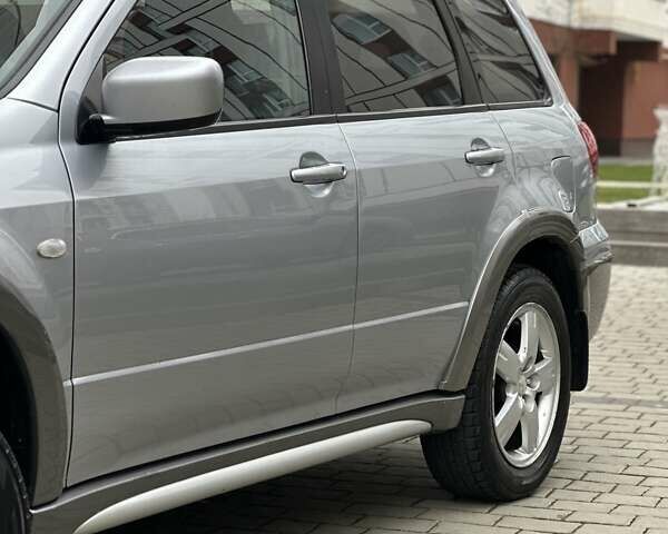 Сірий Міцубісі Аутлендер, об'ємом двигуна 2.4 л та пробігом 98 тис. км за 7199 $, фото 14 на Automoto.ua