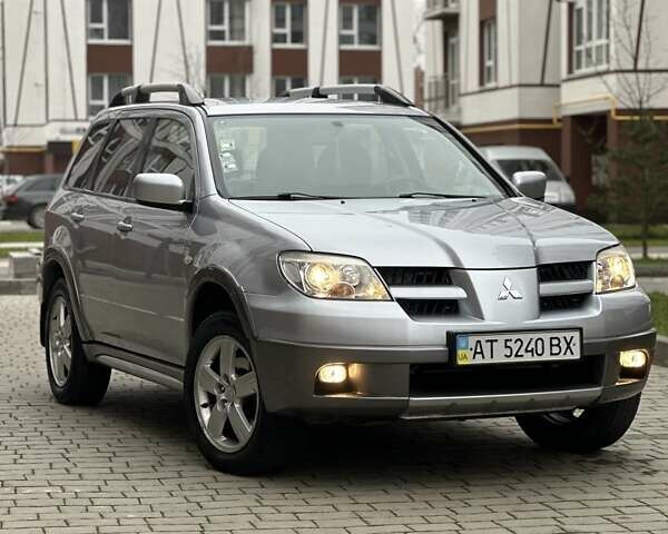 Сірий Міцубісі Аутлендер, об'ємом двигуна 2.4 л та пробігом 98 тис. км за 7199 $, фото 17 на Automoto.ua