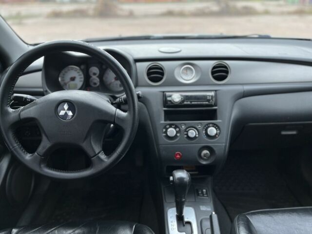 Серый Мицубиси Аутлендер, объемом двигателя 2.4 л и пробегом 264 тыс. км за 6300 $, фото 18 на Automoto.ua