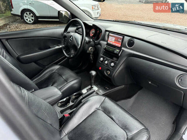 Серый Мицубиси Аутлендер, объемом двигателя 2.38 л и пробегом 204 тыс. км за 6990 $, фото 21 на Automoto.ua