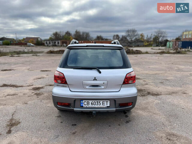 Серый Мицубиси Аутлендер, объемом двигателя 2.4 л и пробегом 264 тыс. км за 6300 $, фото 5 на Automoto.ua