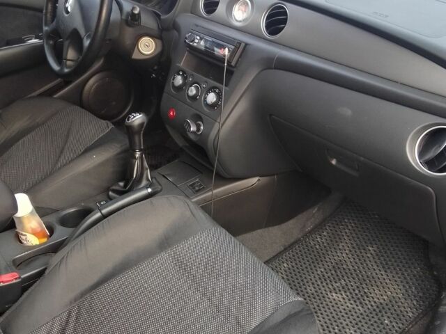 Серый Мицубиси Аутлендер, объемом двигателя 2 л и пробегом 154 тыс. км за 6500 $, фото 9 на Automoto.ua