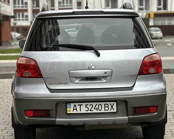 Сірий Міцубісі Аутлендер, об'ємом двигуна 2.4 л та пробігом 98 тис. км за 7199 $, фото 36 на Automoto.ua