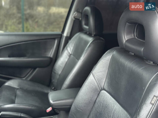 Серый Мицубиси Аутлендер, объемом двигателя 2.38 л и пробегом 204 тыс. км за 6990 $, фото 8 на Automoto.ua