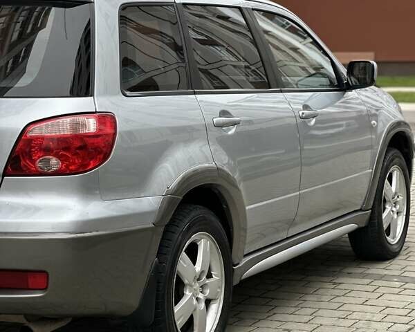 Сірий Міцубісі Аутлендер, об'ємом двигуна 2.4 л та пробігом 98 тис. км за 7199 $, фото 45 на Automoto.ua