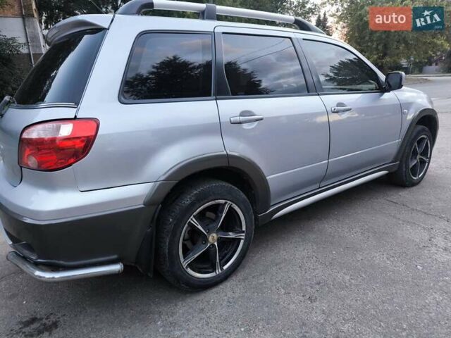 Мицубиси Аутлендер 2006 в Чернигове на Automoto.ua Серый Мицубиси Аутлендер, объемом двигателя 2.4 л и пробегом 147 тыс. км за 6900 $, фото 5 на Automoto.ua