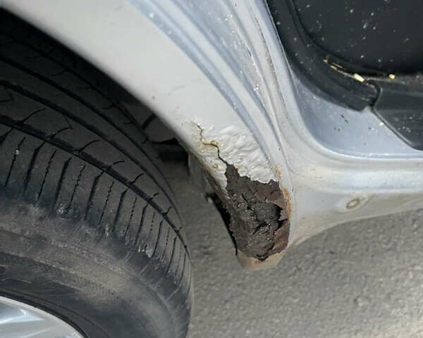 Серый Мицубиси Аутлендер, объемом двигателя 2.4 л и пробегом 307 тыс. км за 4000 $, фото 8 на Automoto.ua