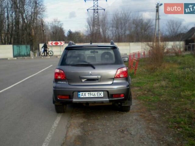 Серый Мицубиси Аутлендер, объемом двигателя 2.4 л и пробегом 235 тыс. км за 6500 $, фото 7 на Automoto.ua