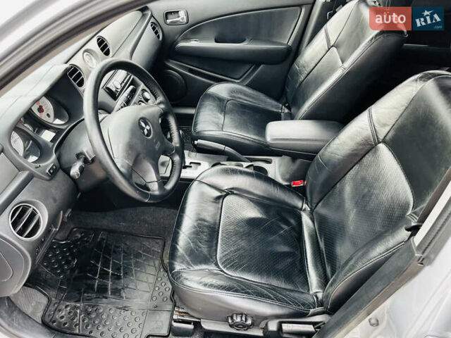 Серый Мицубиси Аутлендер, объемом двигателя 2.4 л и пробегом 264 тыс. км за 6300 $, фото 16 на Automoto.ua