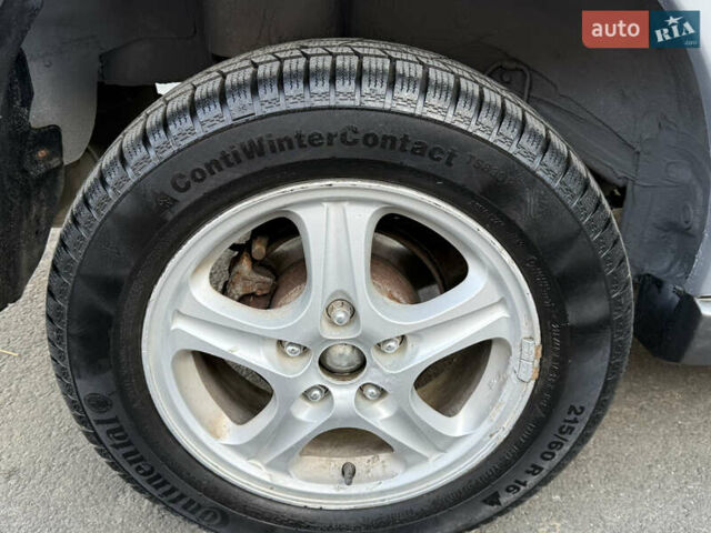 Сірий Міцубісі Аутлендер, об'ємом двигуна 2 л та пробігом 235 тис. км за 5200 $, фото 19 на Automoto.ua