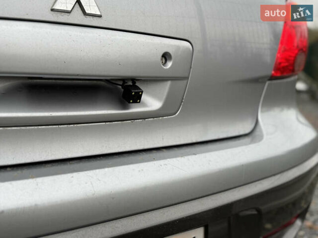Серый Мицубиси Аутлендер, объемом двигателя 2.38 л и пробегом 204 тыс. км за 6990 $, фото 13 на Automoto.ua