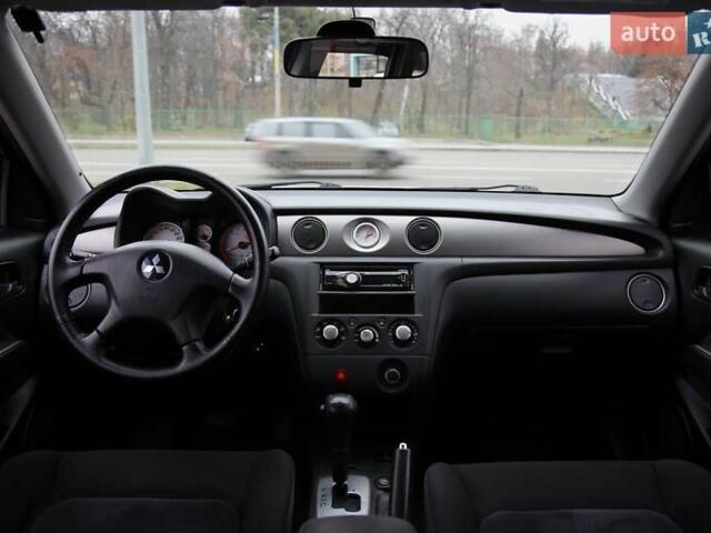 Серый Мицубиси Аутлендер, объемом двигателя 2.4 л и пробегом 171 тыс. км за 8200 $, фото 11 на Automoto.ua