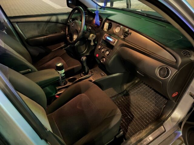 Серый Мицубиси Аутлендер, объемом двигателя 2 л и пробегом 200 тыс. км за 5400 $, фото 7 на Automoto.ua