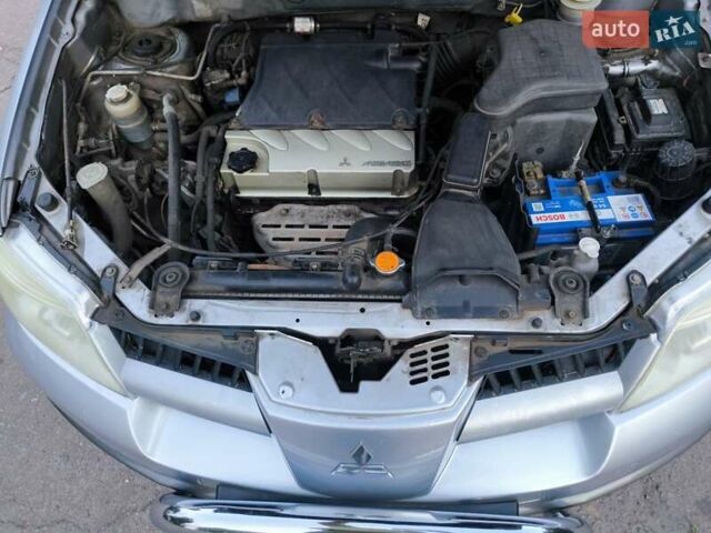 Мицубиси Аутлендер 2006 в Чернигове на Automoto.ua Серый Мицубиси Аутлендер, объемом двигателя 2.4 л и пробегом 147 тыс. км за 6900 $, фото 19 на Automoto.ua