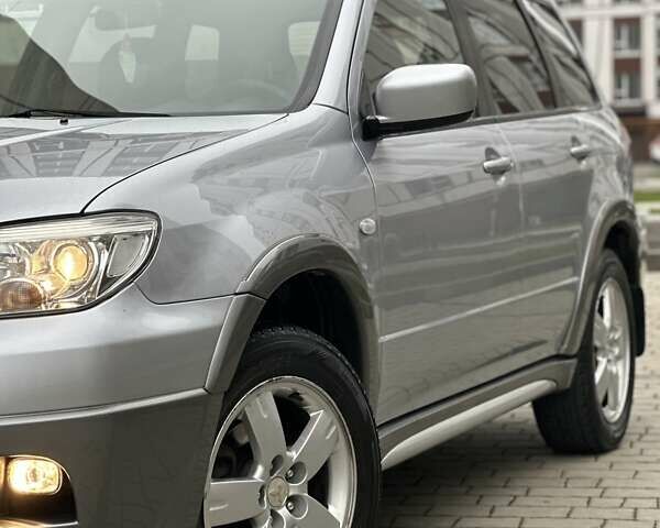 Сірий Міцубісі Аутлендер, об'ємом двигуна 2.4 л та пробігом 98 тис. км за 7199 $, фото 4 на Automoto.ua