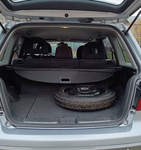 Сірий Міцубісі Аутлендер, об'ємом двигуна 2 л та пробігом 312 тис. км за 8300 $, фото 10 на Automoto.ua