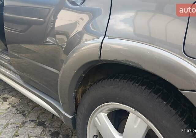 Серый Мицубиси Аутлендер, объемом двигателя 2.38 л и пробегом 600 тыс. км за 5700 $, фото 2 на Automoto.ua