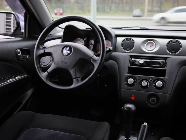 Серый Мицубиси Аутлендер, объемом двигателя 2.4 л и пробегом 171 тыс. км за 8200 $, фото 10 на Automoto.ua