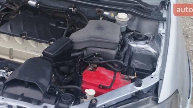 Серый Мицубиси Аутлендер, объемом двигателя 2.4 л и пробегом 261 тыс. км за 5700 $, фото 5 на Automoto.ua