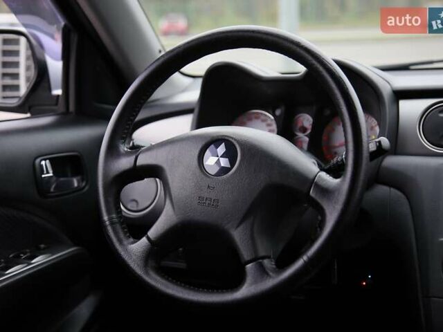 Серый Мицубиси Аутлендер, объемом двигателя 2.4 л и пробегом 171 тыс. км за 8200 $, фото 13 на Automoto.ua