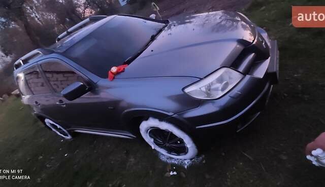 Сірий Міцубісі Аутлендер, об'ємом двигуна 2.38 л та пробігом 204 тис. км за 6500 $, фото 9 на Automoto.ua