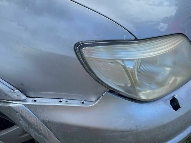 Серый Мицубиси Аутлендер, объемом двигателя 2.4 л и пробегом 127 тыс. км за 4400 $, фото 4 на Automoto.ua