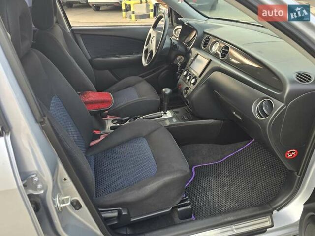 Серый Мицубиси Аутлендер, объемом двигателя 2.4 л и пробегом 243 тыс. км за 6999 $, фото 12 на Automoto.ua