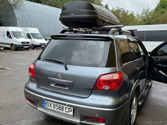 Мицубиси Аутлендер 2006 в Хмельницком на Automoto.ua Серый Мицубиси Аутлендер, объемом двигателя 2.4 л и пробегом 240 тыс. км за 6500 $, фото 9 на Automoto.ua