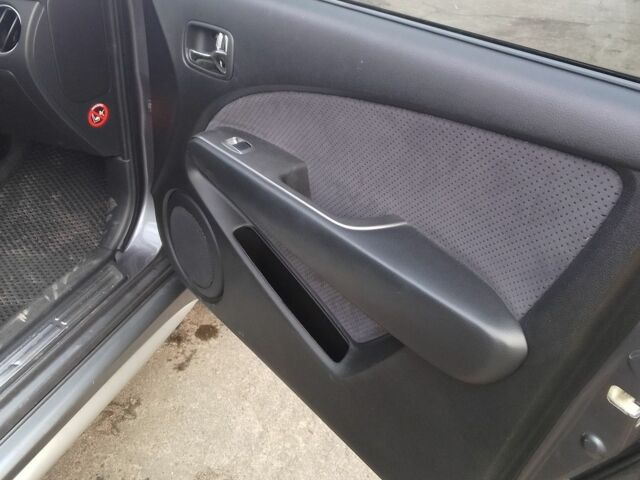 Серый Мицубиси Аутлендер, объемом двигателя 2 л и пробегом 154 тыс. км за 6500 $, фото 7 на Automoto.ua