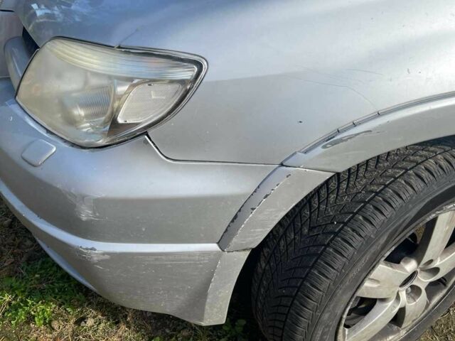 Серый Мицубиси Аутлендер, объемом двигателя 2.4 л и пробегом 127 тыс. км за 4400 $, фото 11 на Automoto.ua