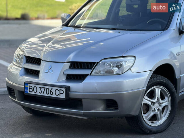 Сірий Міцубісі Аутлендер, об'ємом двигуна 2 л та пробігом 235 тис. км за 5200 $, фото 7 на Automoto.ua