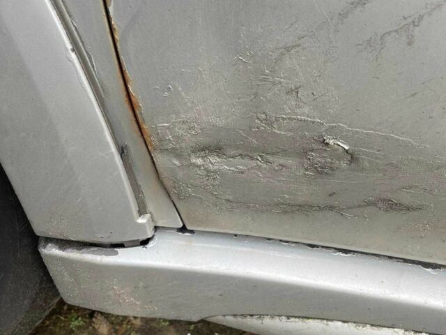 Серый Мицубиси Аутлендер, объемом двигателя 2.4 л и пробегом 127 тыс. км за 4400 $, фото 12 на Automoto.ua