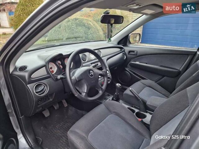 Серый Мицубиси Аутлендер, объемом двигателя 2 л и пробегом 240 тыс. км за 6300 $, фото 12 на Automoto.ua