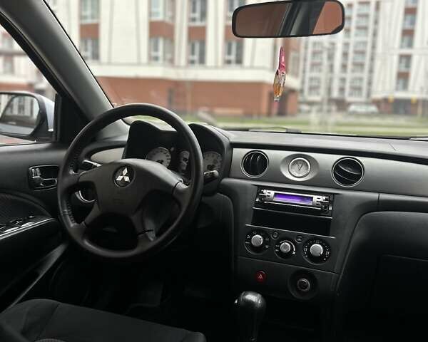 Сірий Міцубісі Аутлендер, об'ємом двигуна 2.4 л та пробігом 98 тис. км за 7199 $, фото 67 на Automoto.ua