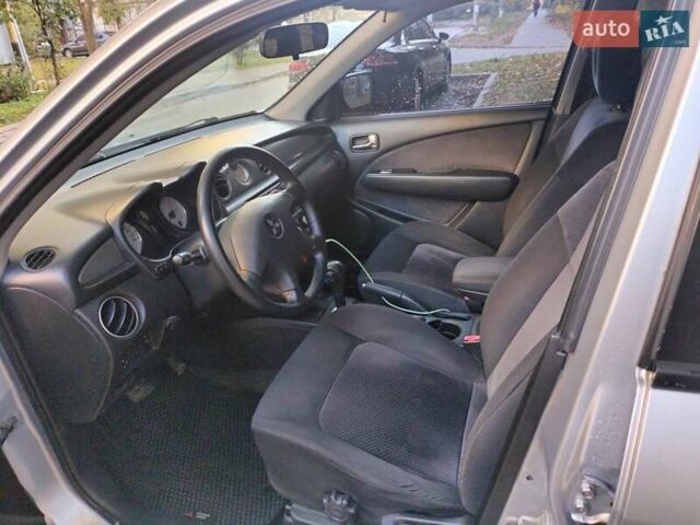 Серый Мицубиси Аутлендер, объемом двигателя 2.4 л и пробегом 186 тыс. км за 6350 $, фото 2 на Automoto.ua