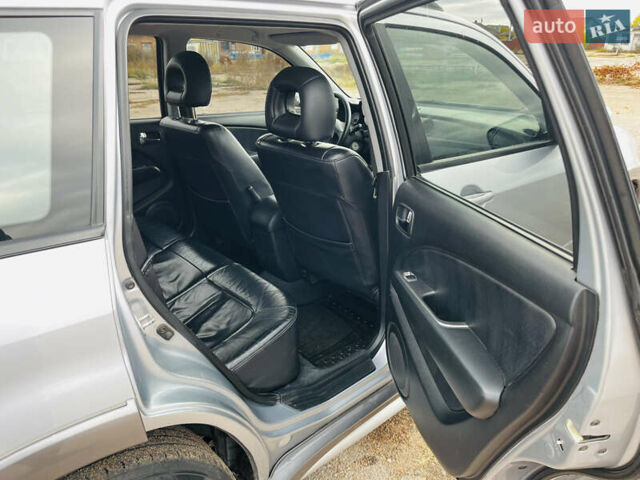 Серый Мицубиси Аутлендер, объемом двигателя 2.4 л и пробегом 264 тыс. км за 6300 $, фото 13 на Automoto.ua