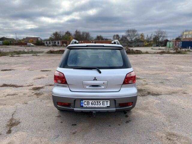 Серый Мицубиси Аутлендер, объемом двигателя 2.4 л и пробегом 264 тыс. км за 6300 $, фото 5 на Automoto.ua