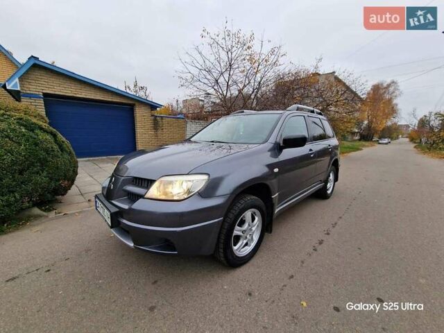 Серый Мицубиси Аутлендер, объемом двигателя 2 л и пробегом 240 тыс. км за 6300 $, фото 8 на Automoto.ua