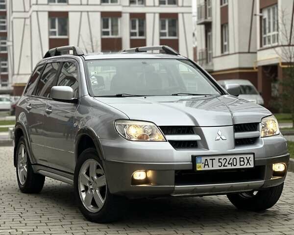 Сірий Міцубісі Аутлендер, об'ємом двигуна 2.4 л та пробігом 98 тис. км за 7199 $, фото 22 на Automoto.ua