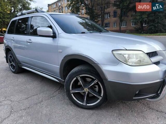 Мицубиси Аутлендер 2006 в Чернигове на Automoto.ua Серый Мицубиси Аутлендер, объемом двигателя 2.4 л и пробегом 147 тыс. км за 6900 $, фото 4 на Automoto.ua