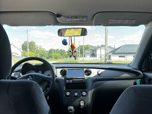 Серый Мицубиси Аутлендер, объемом двигателя 2 л и пробегом 209 тыс. км за 5999 $, фото 6 на Automoto.ua