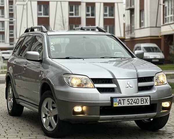 Сірий Міцубісі Аутлендер, об'ємом двигуна 2.4 л та пробігом 98 тис. км за 7199 $, фото 23 на Automoto.ua
