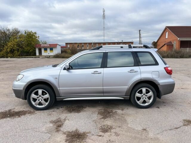 Серый Мицубиси Аутлендер, объемом двигателя 2.4 л и пробегом 264 тыс. км за 6300 $, фото 3 на Automoto.ua