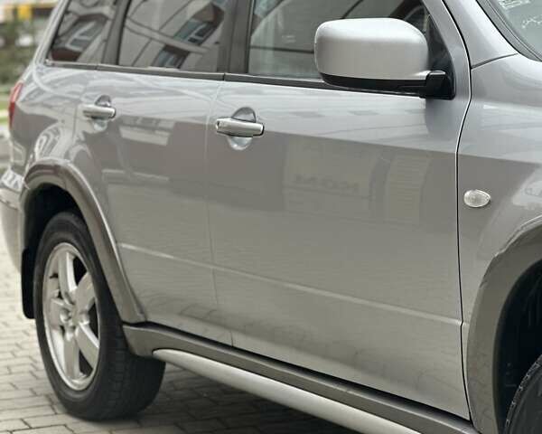 Сірий Міцубісі Аутлендер, об'ємом двигуна 2.4 л та пробігом 98 тис. км за 7199 $, фото 31 на Automoto.ua