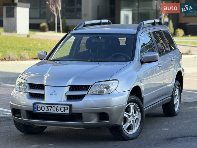 Сірий Міцубісі Аутлендер, об'ємом двигуна 2 л та пробігом 235 тис. км за 5200 $, фото 13 на Automoto.ua
